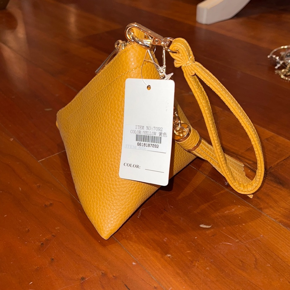 Leather triangle purse with tassel